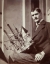 Anonyme, Lyonel Feininger avec une maquette de bâteau, ca. 1896, photographie. The Lyonel Feininger Project LLC, New York – Berlin Anonyme, Lyonel Feininger avec une maquette de bâteau, ca. 1896, photographie. The Lyonel Feininger Project LLC, New York – Berlin