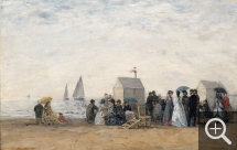 Eugène BOUDIN (1824-1898), La Plage de Trouville, 1867, huile sur bois, 31 x 48 cm. Paris, musée d’Orsay, donation du Dr Eduardo Mollard, 1961. © RMN-Grand Palais / Hervé Lewandowski