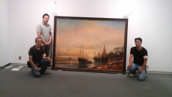 L'équipe technique devant la toile d'Isabey, Les Écores, 1839. Trouville-sur-Mer, musée villa Montebello. © MuMa Le Havre